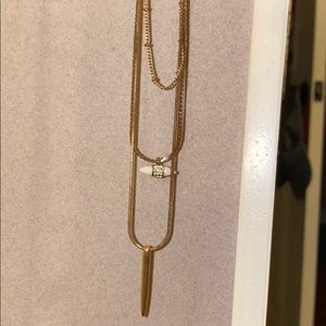 Three chain layered gold necklace